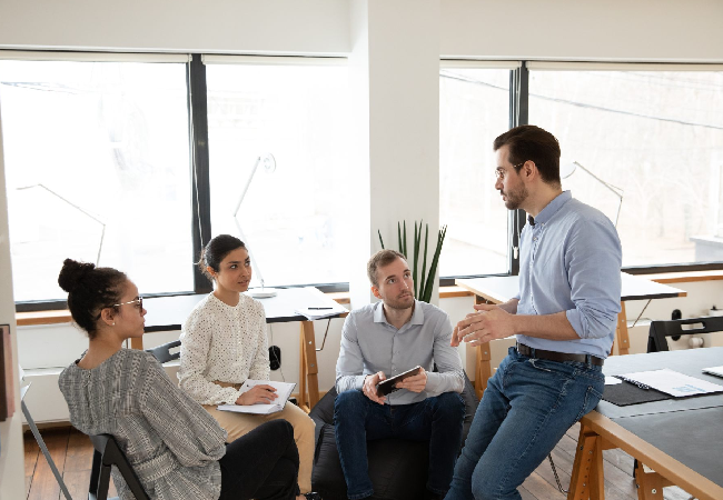 Professional giving a presentation to colleagues