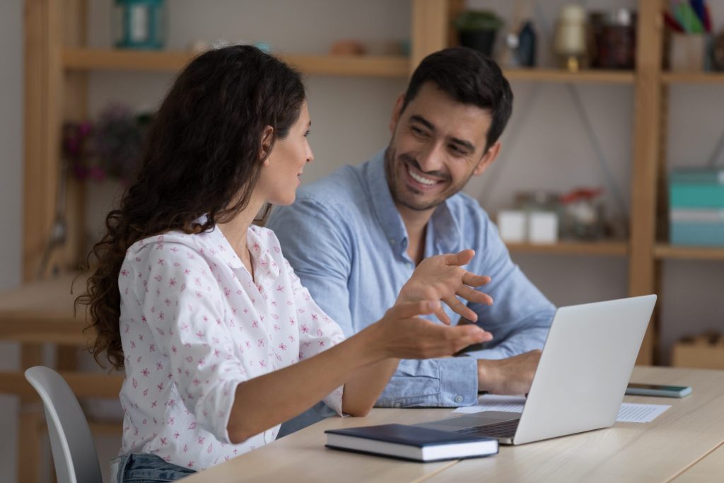 Couple working together on the laptop